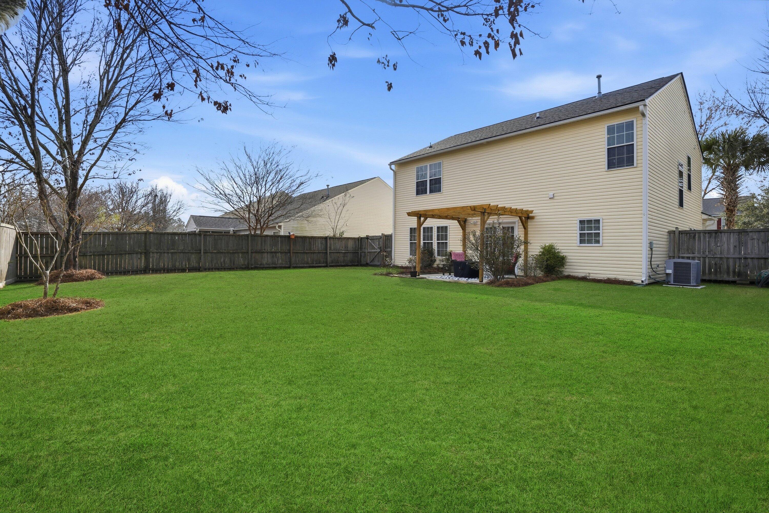 9657 South Carousel Circle Summerville, SC 29485 - Photo 34 of 51 038_DSC03261_grass_ae63eae7-807f-4c68-94