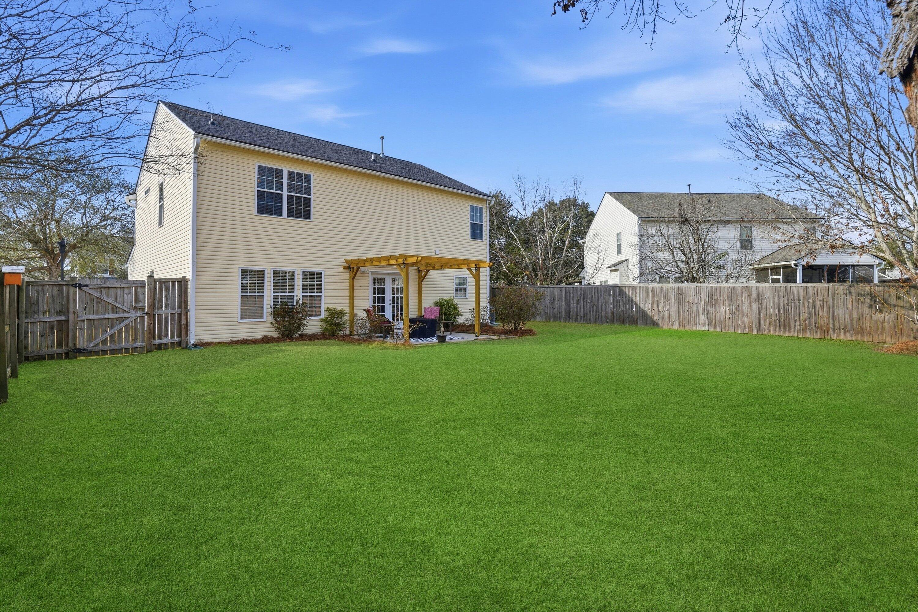 9657 South Carousel Circle Summerville, SC 29485 - Photo 35 of 51 037_DSC03258_grass_b5fa0af4-75cc-4708-85