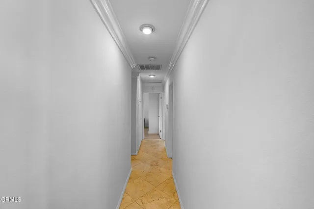 a bathroom with a tub a toilet and a sink