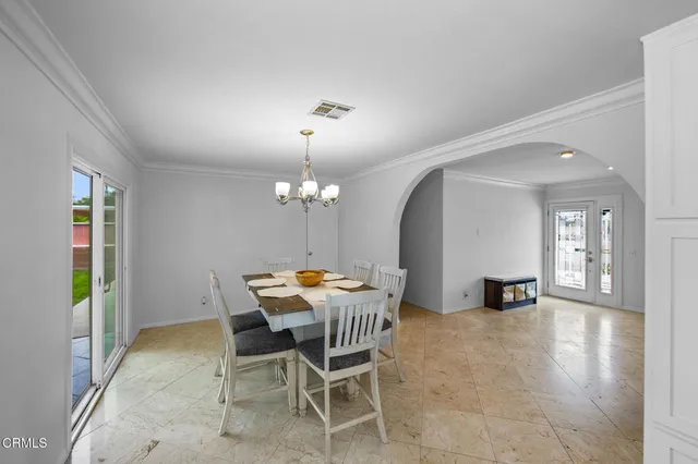 a view of a hallway with white walls