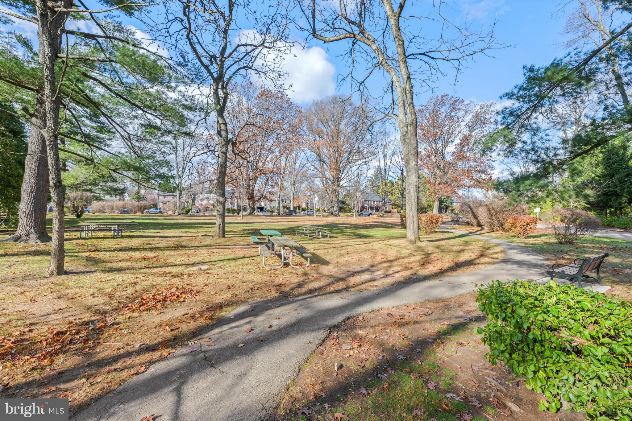 442 East Spring Avenue Ardmore, PA 19003 - Photo 18 of 72 Serene park path through autumn trees.
