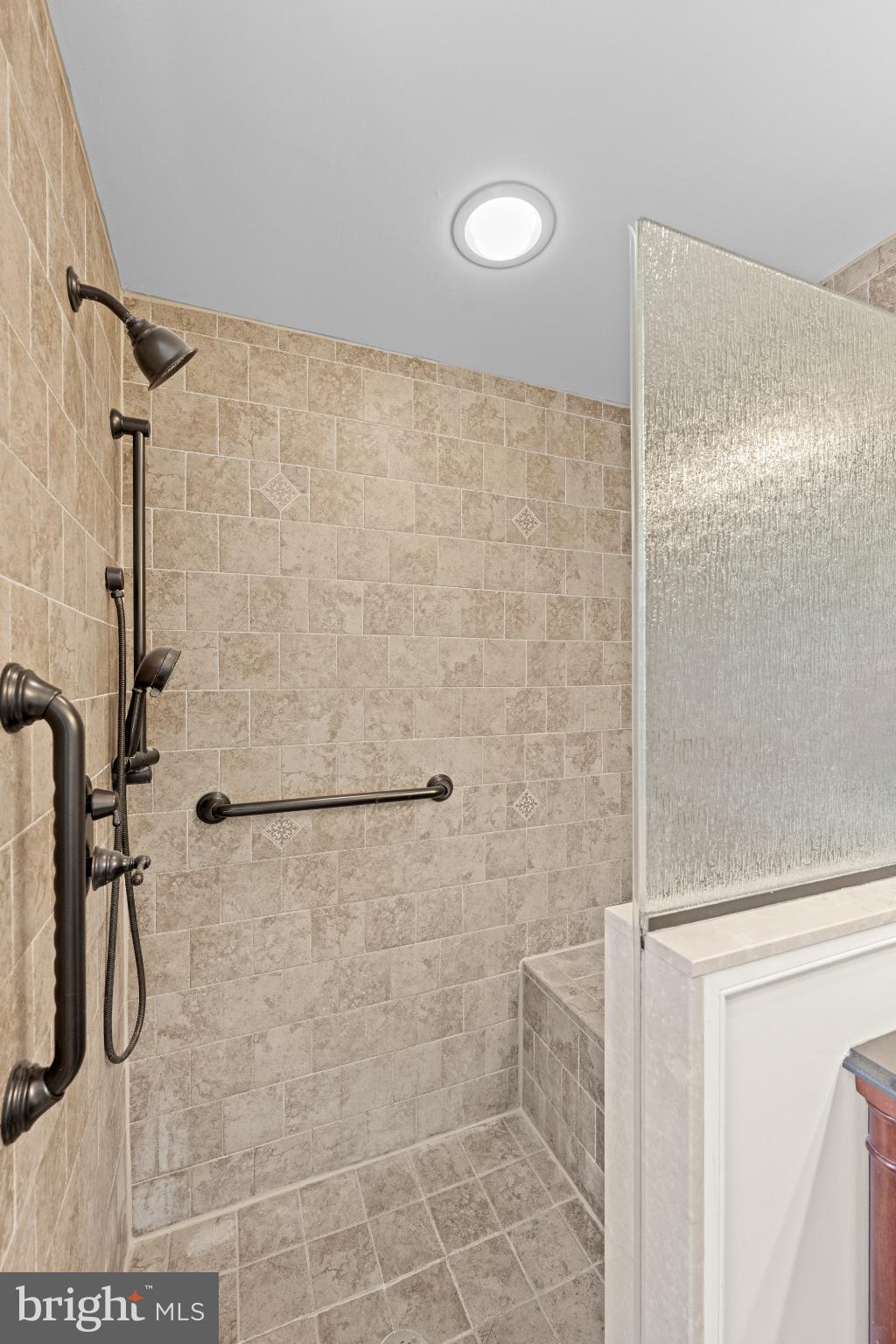 442 East Spring Avenue Ardmore, PA 19003 - Photo 53 of 72 Elegant stone shower with modern fixtures.