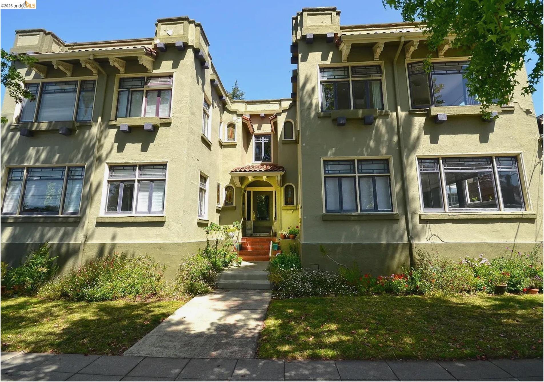 2725 Prince Street, Unit 10 Berkeley, CA 94705 - Photo 2 of 2 Stucco exterior with architectural corbels and a recessed entry