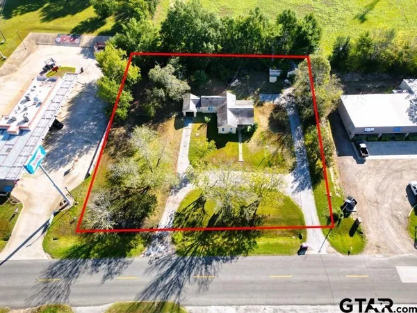 a view of yard with an outdoor seating