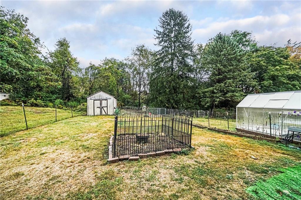 421 Sharon Road Coraopolis, PA 15108 - Photo 21 of 25 Large backyard with endless gardening possibilities! From sprawling vegetable patches and vibrant flower beds to a potential herb garden or even a small orchard, there's room for every green dream