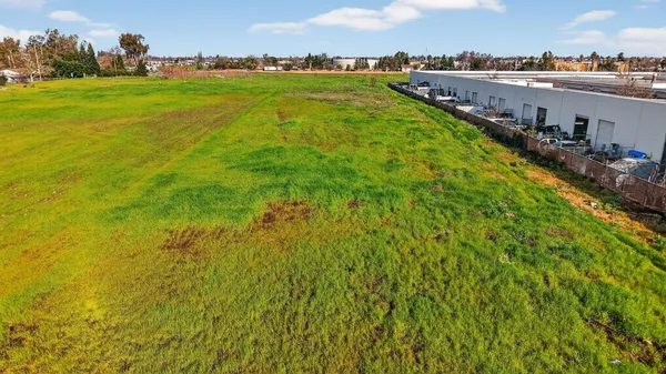 a view of a lake with a big yard