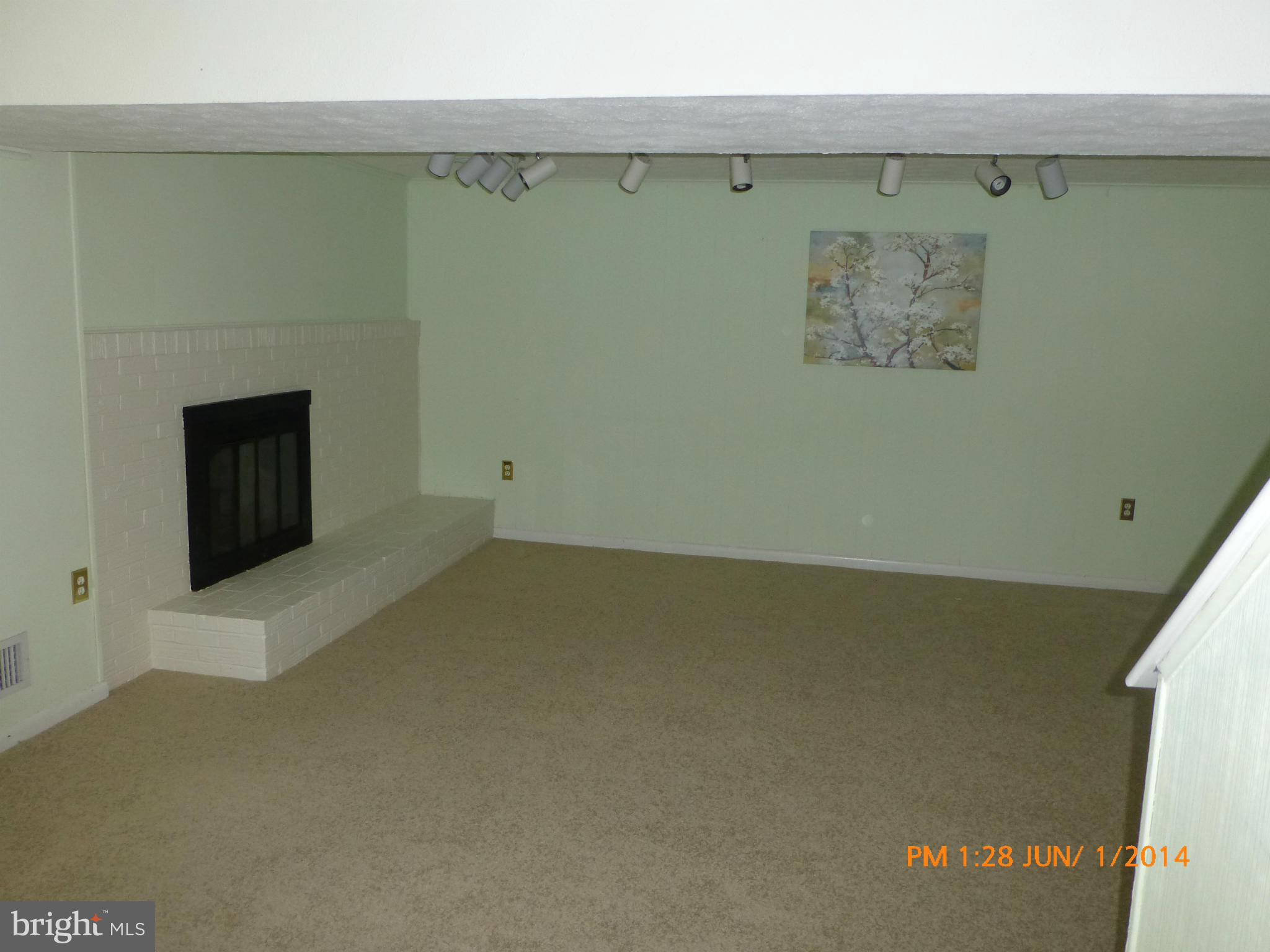 210 Rolling Road Gaithersburg, MD 20877 - Photo 16 of 24 Family Room rear area