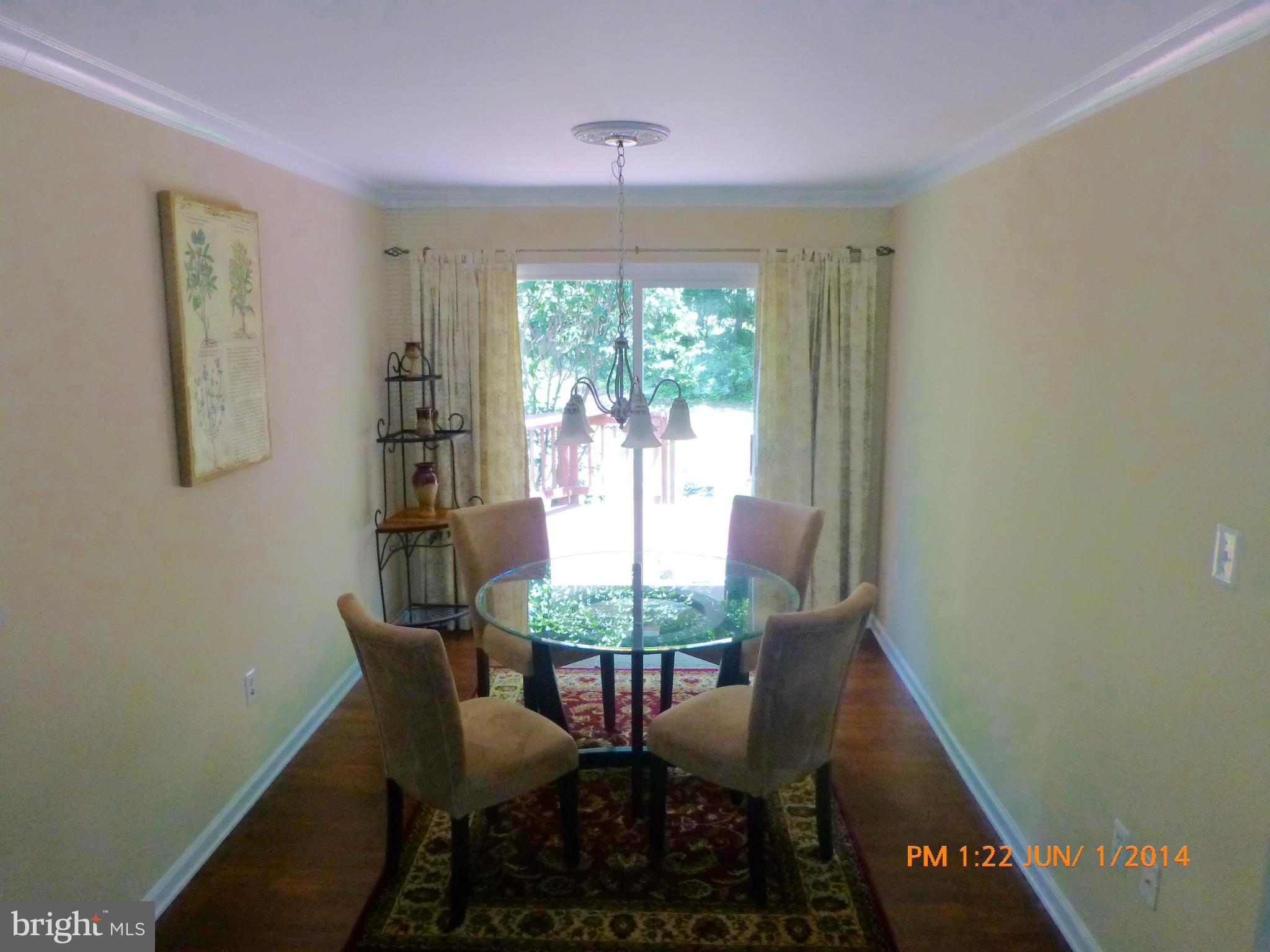 210 Rolling Road Gaithersburg, MD 20877 - Photo 6 of 24 Dining Room curtains opened