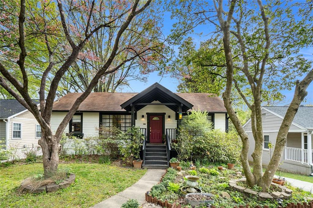 320 Greenwood Avenue Decatur, GA 30030 - Photo 1 of 1 a front view of a house with garden