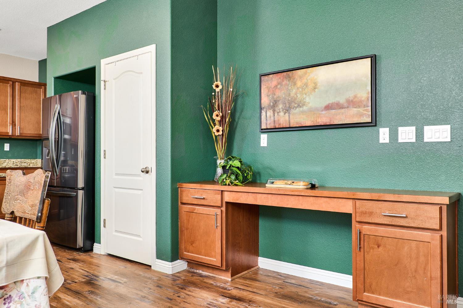 4398 Artisan Path, Unit 724 :2 Rio Vista, CA 94571 - Photo 12 of 24 a room with cabinets and wooden floor