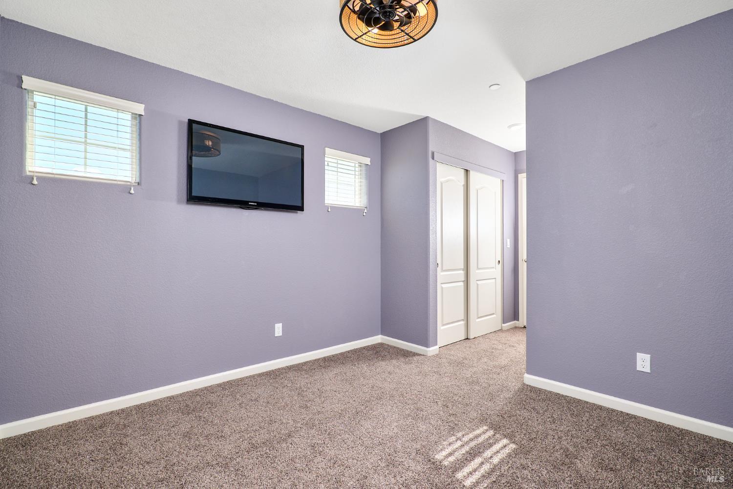 4398 Artisan Path, Unit 724 :2 Rio Vista, CA 94571 - Photo 17 of 24 a view of an empty room with window and wooden floor