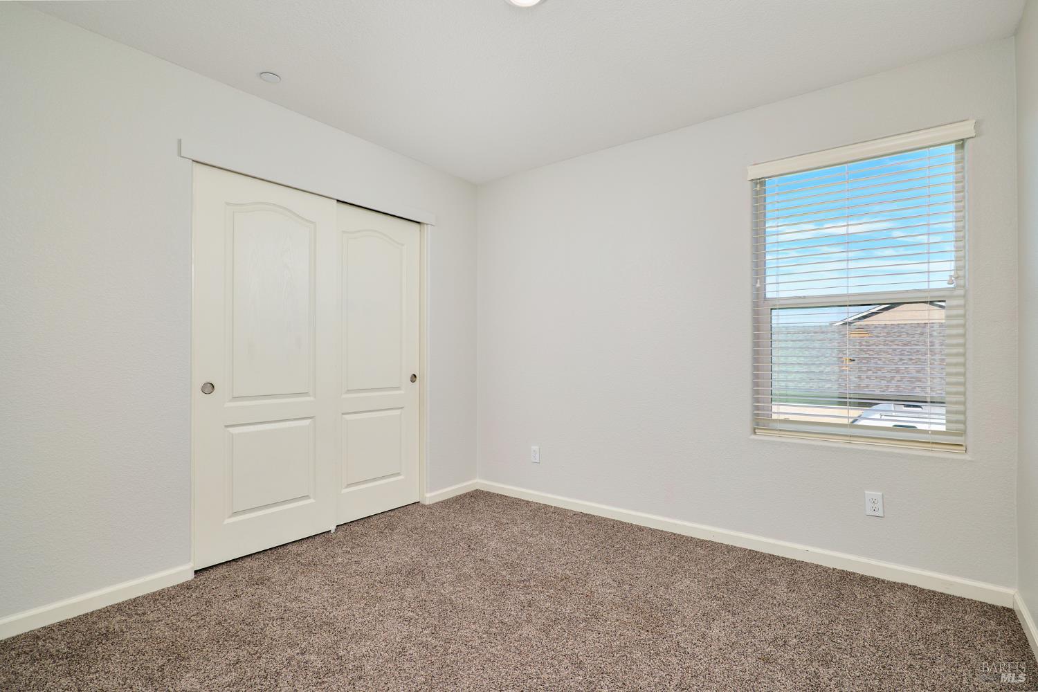 4398 Artisan Path, Unit 724 :2 Rio Vista, CA 94571 - Photo 19 of 24 an empty room with windows and closet