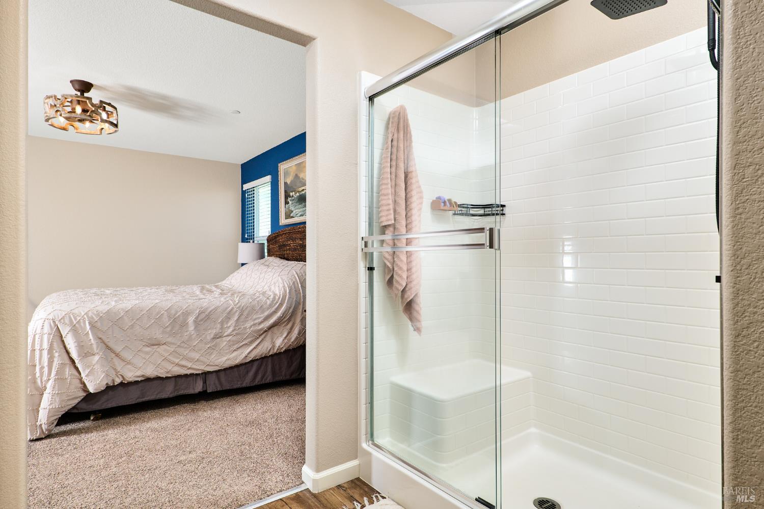 4398 Artisan Path, Unit 724 :2 Rio Vista, CA 94571 - Photo 22 of 24 a bedroom with a bed and a shower