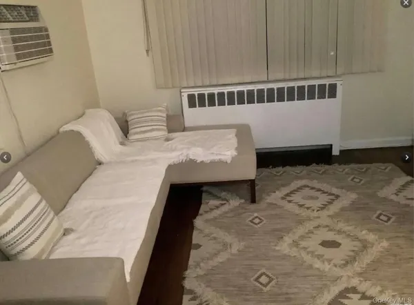 a view of balcony with furniture