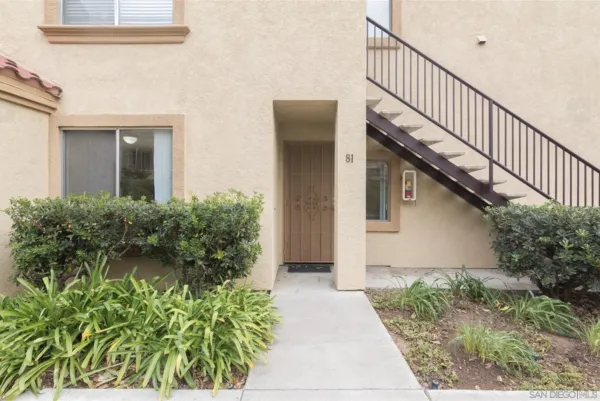 a view of a swimming pool with a lounge chairs