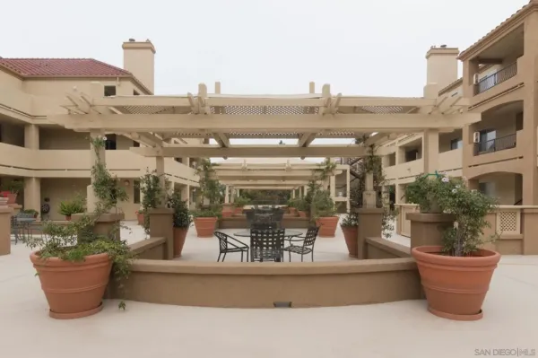 a view of a swimming pool with a chair