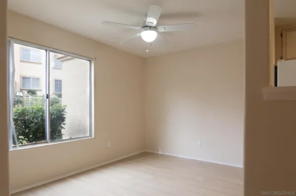 a kitchen with a stove a sink and a refrigerator