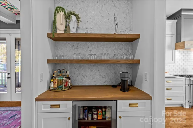 a kitchen with a stove and cabinets