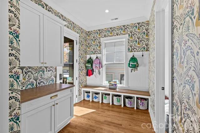 a bedroom with a bed and dresser