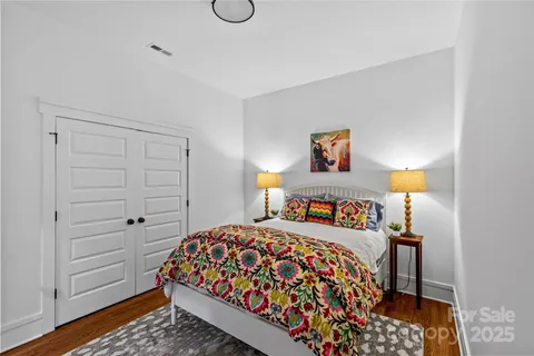 a view of a house with backyard porch and sitting area