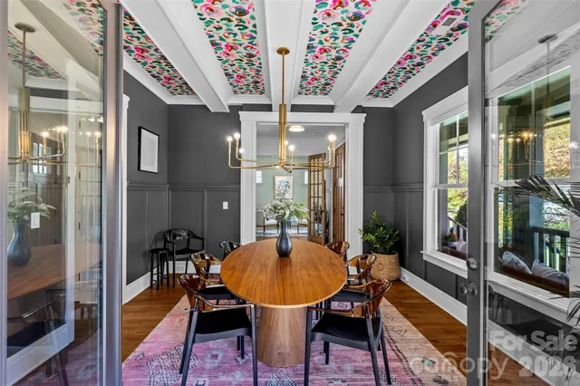 a kitchen with stainless steel appliances granite countertop a stove top oven a sink a counter space and cabinets