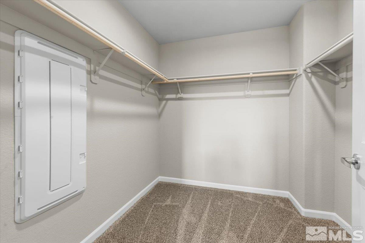 1180 Arrastra Road, Unit LOT 15 Reno, NV 89512 - Photo 19 of 34 a view of an empty walk in closet