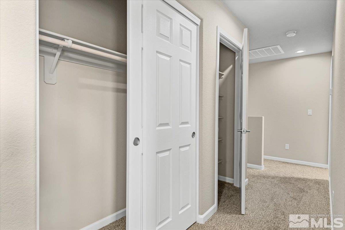 1180 Arrastra Road, Unit LOT 15 Reno, NV 89512 - Photo 33 of 34 a bathroom with a shower and a glass door