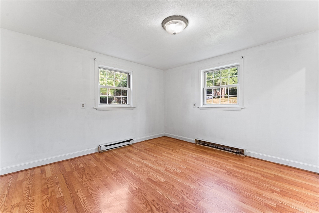 3 Walker Road, Unit 1 North Andover, MA 01845 - Photo 11 of 19 an empty room with a window