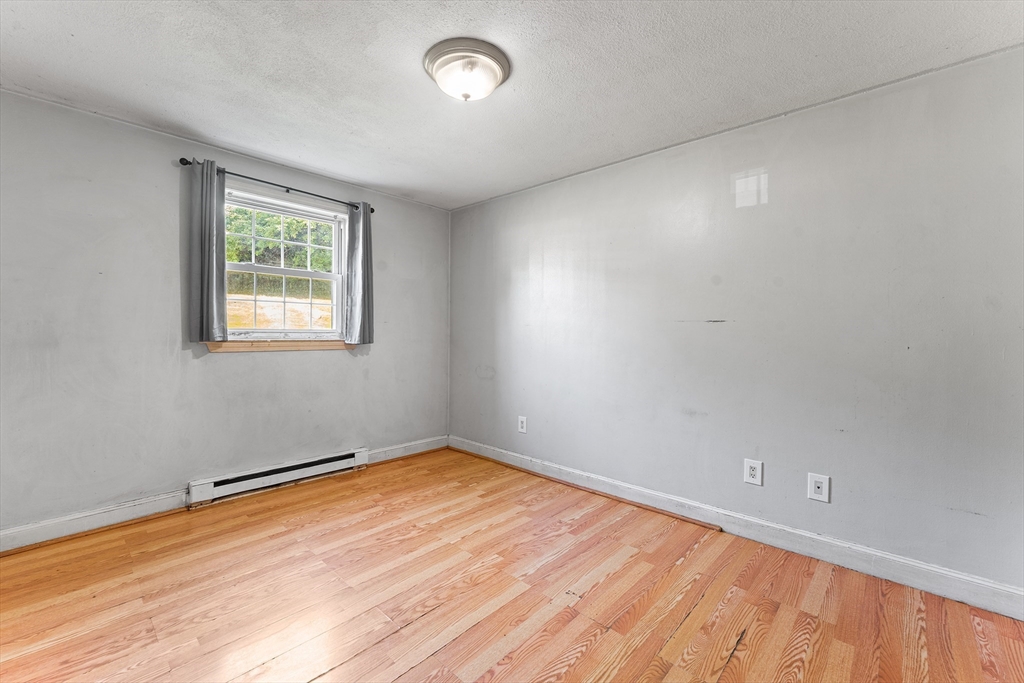 3 Walker Road, Unit 1 North Andover, MA 01845 - Photo 16 of 19 an empty room with a window