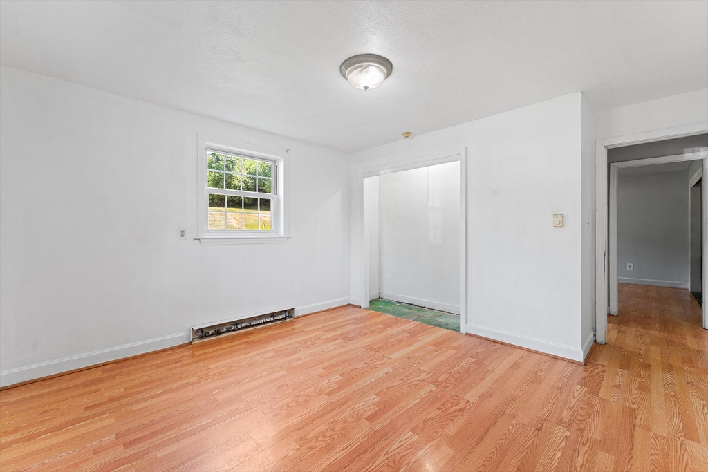 3 Walker Road, Unit 1 North Andover, MA 01845 - Photo 17 of 19 a view of empty room with wooden floor