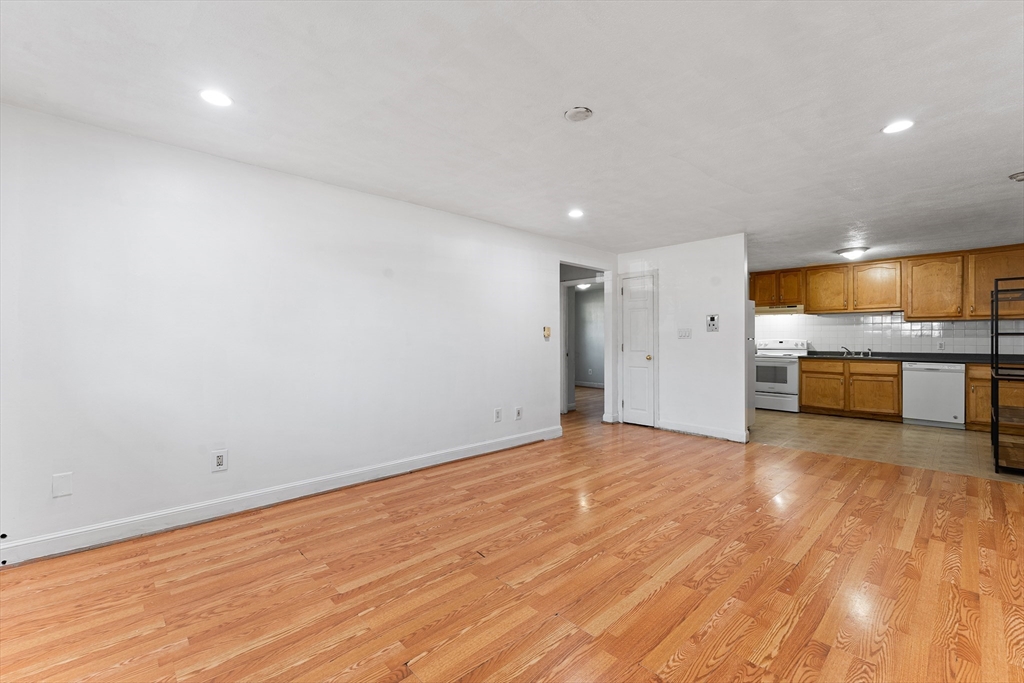 3 Walker Road, Unit 1 North Andover, MA 01845 - Photo 7 of 19 a view of a livingroom with a fireplace