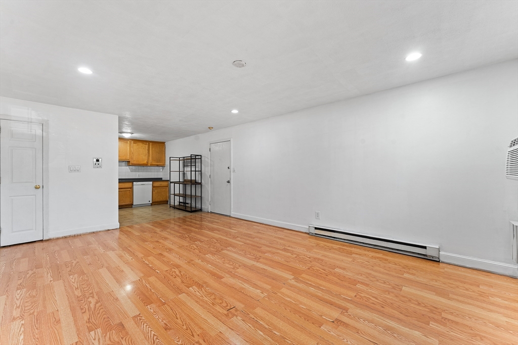 3 Walker Road, Unit 1 North Andover, MA 01845 - Photo 8 of 19 a view of empty room with wooden floor