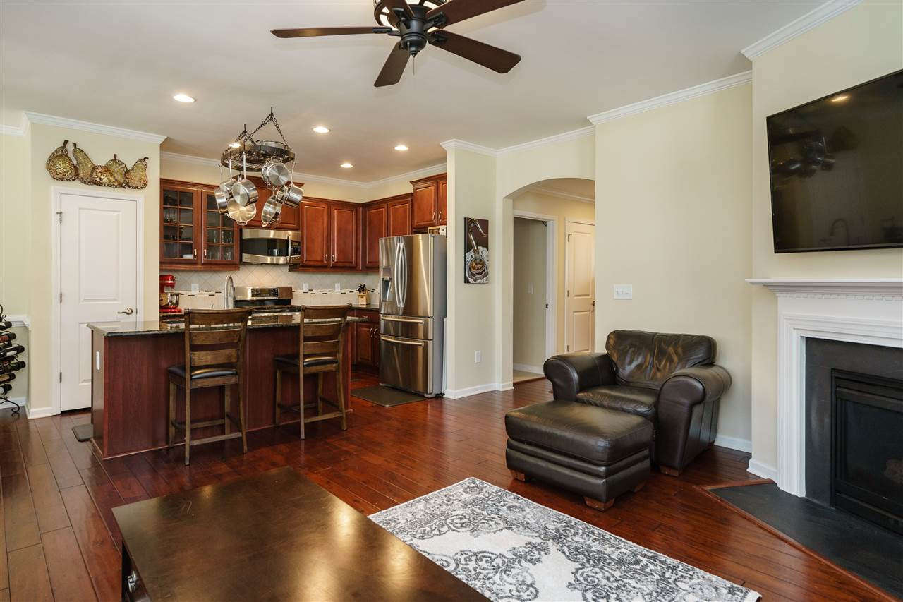 5622 Wade Park Boulevard Raleigh, NC 27607 - Photo 5 of 25 LIVING ROOM OPENS UP TO KITCHEN AND FOYER CREATING A SPACIOUS FEEL AND PERFECT FOR ENTERTAINING GUESTS! LIVING ROOM