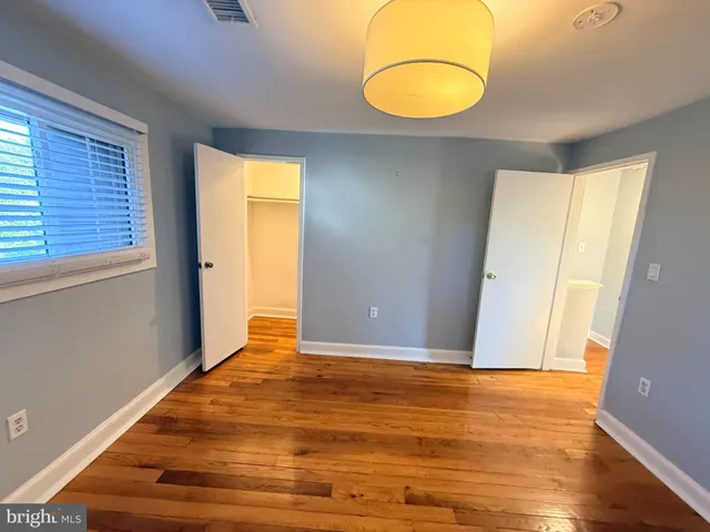 wooden floor and window in a room