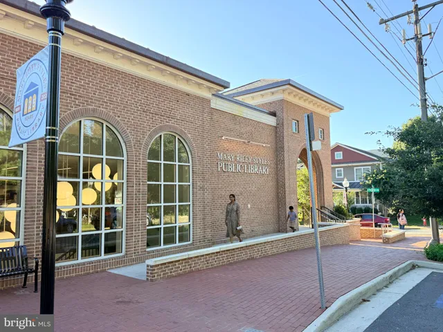 a view of outdoor space with garden and trees