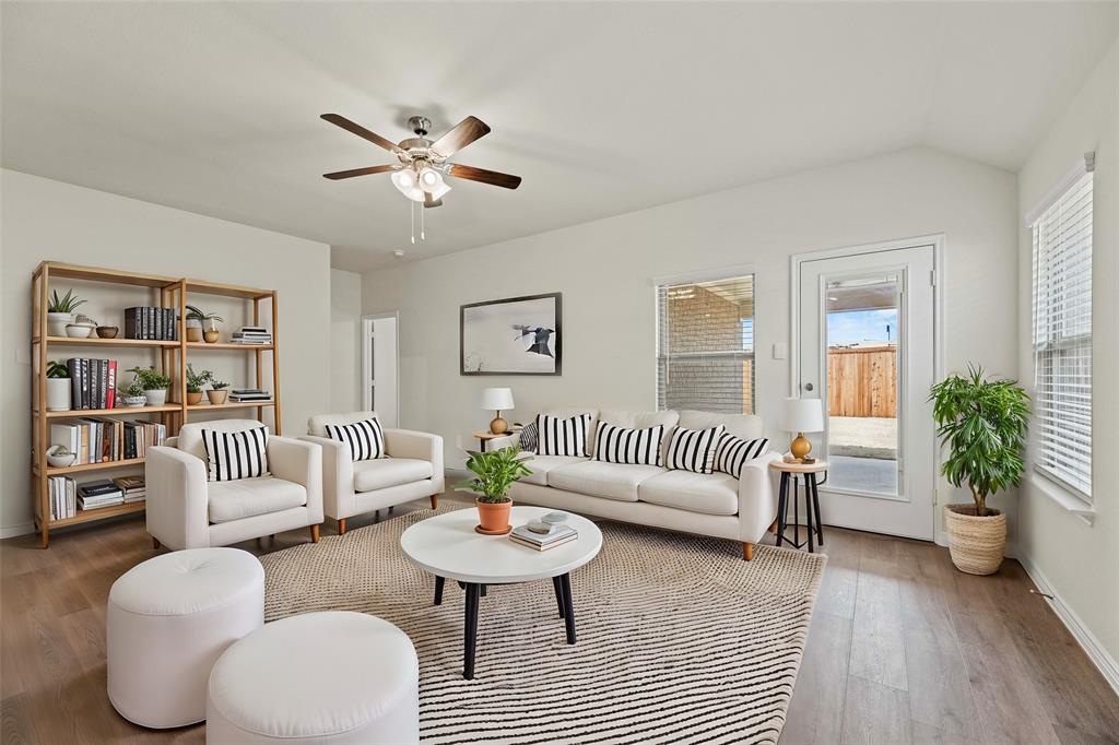 411 Revolution Road Fate, TX 75087 - Photo 8 of 34 a living room with furniture