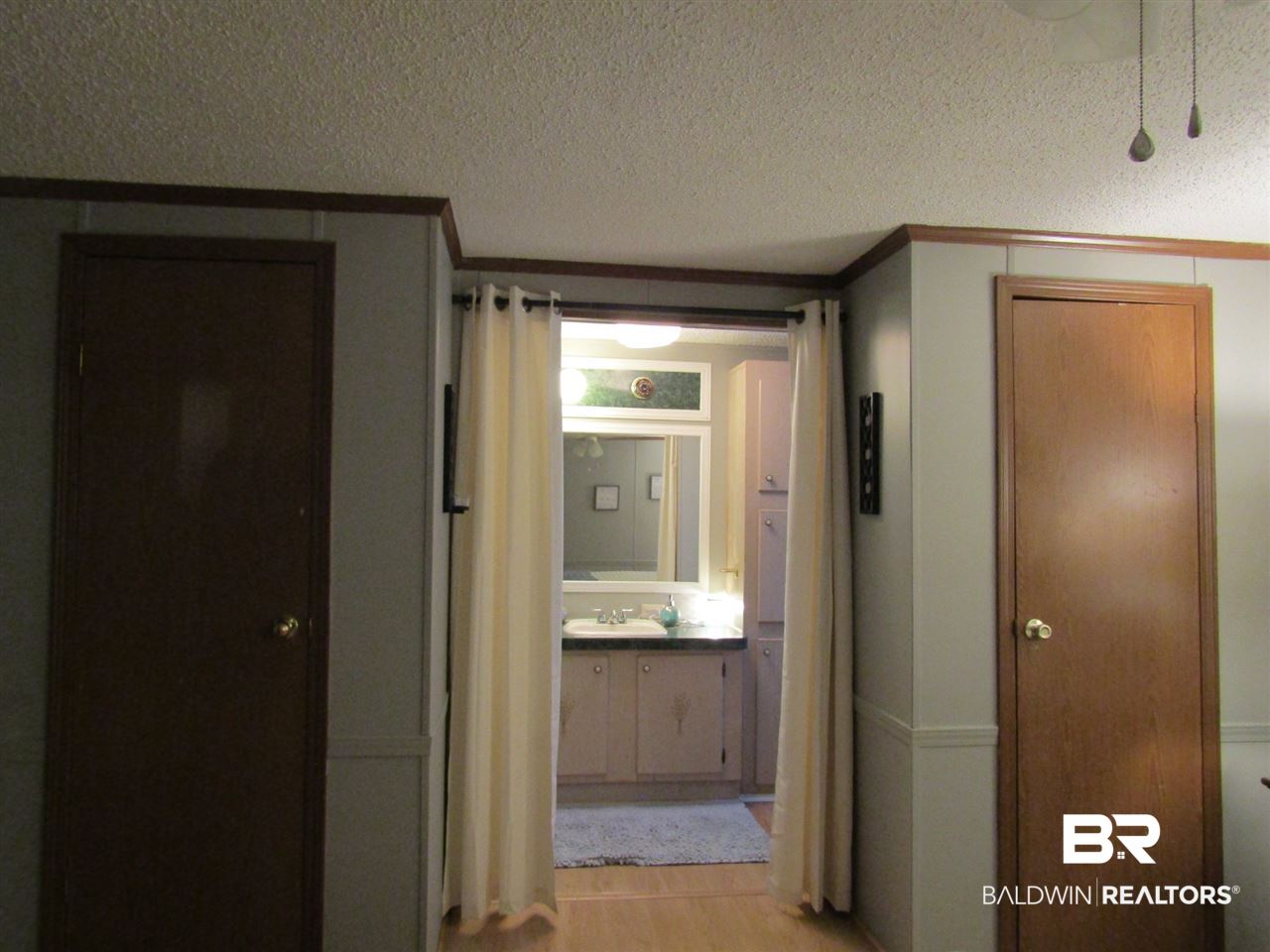 1200 Ridgewood Drive Lillian, AL 36549 - Photo 12 of 25 His & Hers Closets