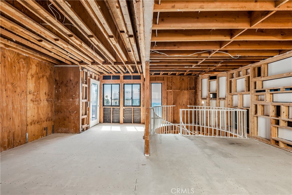 16995 8th Street Sunset Beach, CA 90742 - Photo 26 of 51 a view of an empty room with a garage