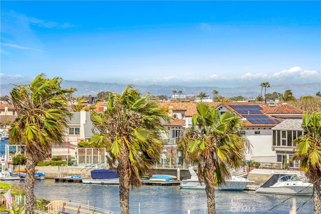 16995 8th Street Sunset Beach, CA 90742 - Photo 29 of 51 a view of building with outdoor space