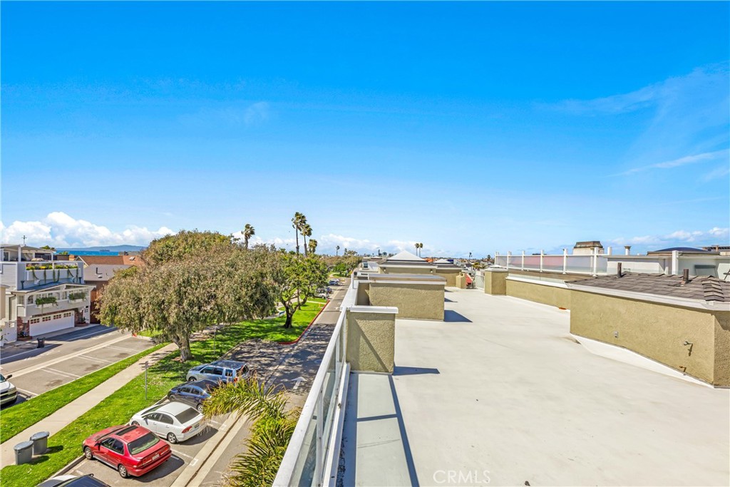 16995 8th Street Sunset Beach, CA 90742 - Photo 32 of 51 a view of a swimming pool with a terrace