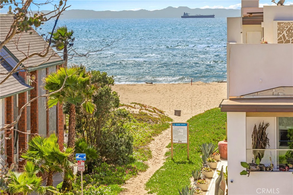 16995 8th Street Sunset Beach, CA 90742 - Photo 42 of 51 a view of a house with a yard