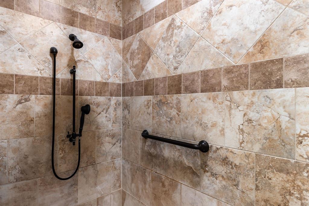 3794 County Road 1089 Celeste, TX 75423 - Photo 16 of 40 Bathroom view of a tile shower