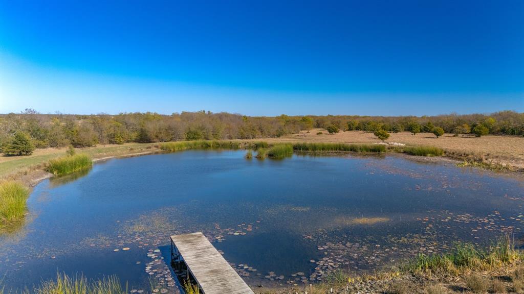 3794 County Road 1089 Celeste, TX 75423 - Photo 2 of 40 Water view featuring a dock