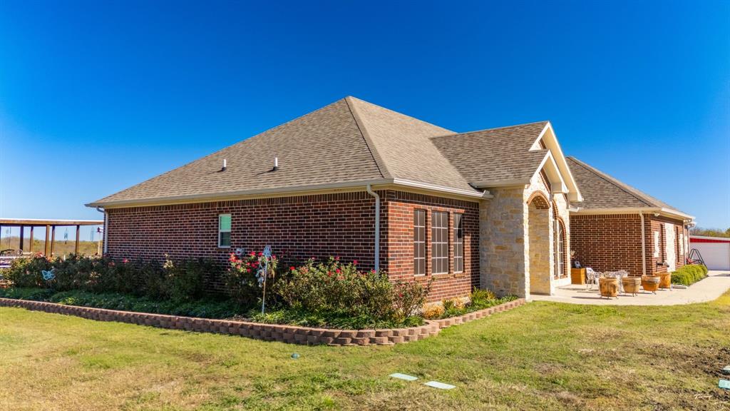 3794 County Road 1089 Celeste, TX 75423 - Photo 37 of 40 a view of a house with yard and plants