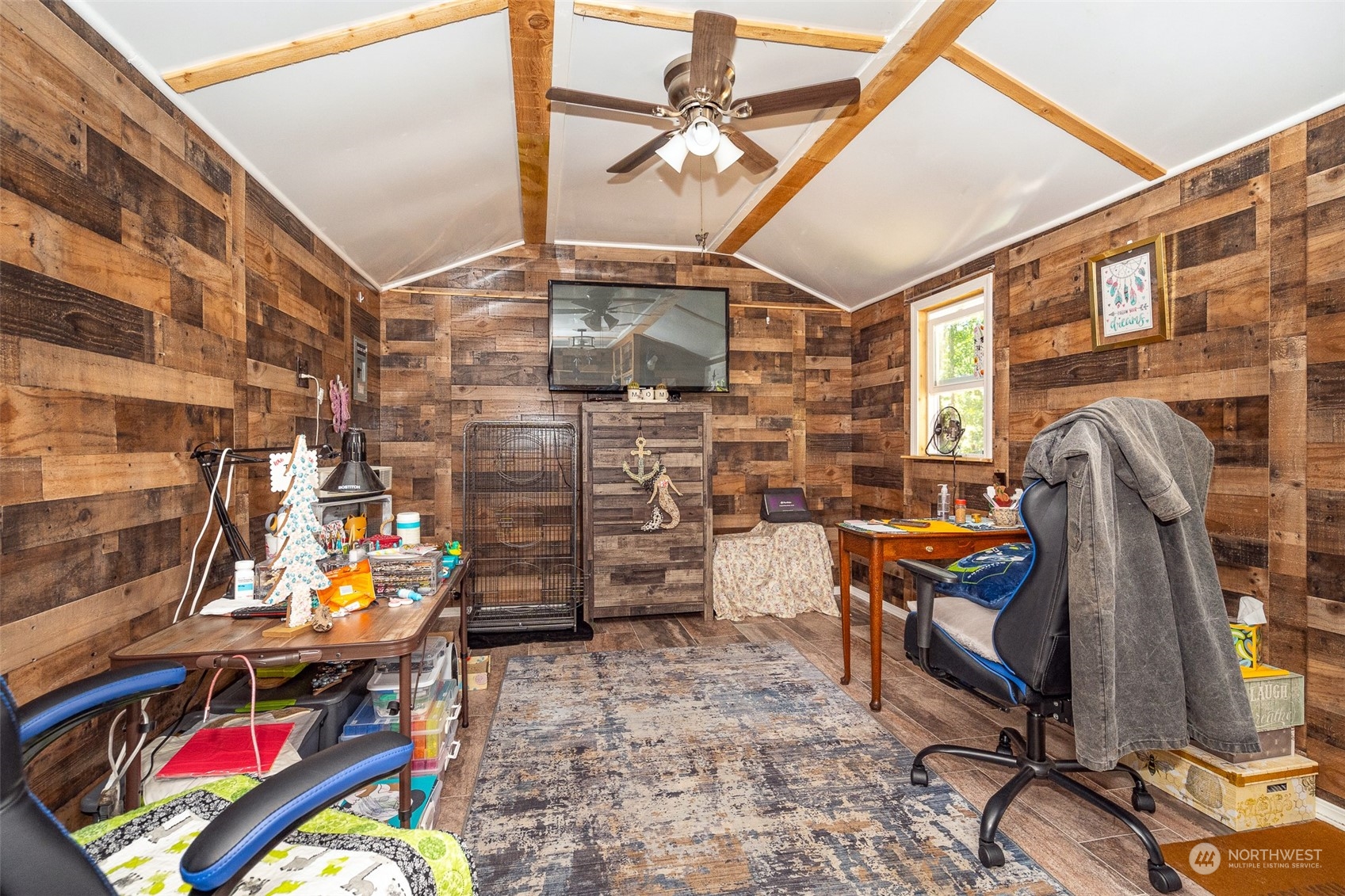 149 Knowles Road Winlock, WA 98596 - Photo 12 of 38 a view of a storage room with a lot of stuff