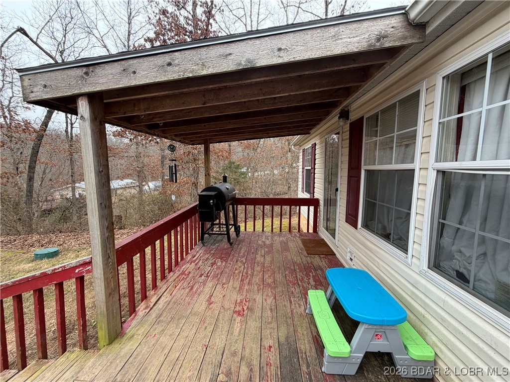 7 Arapaho Road Eldon, MO 65026 - Photo 2 of 26 Covered Front Porch Area
