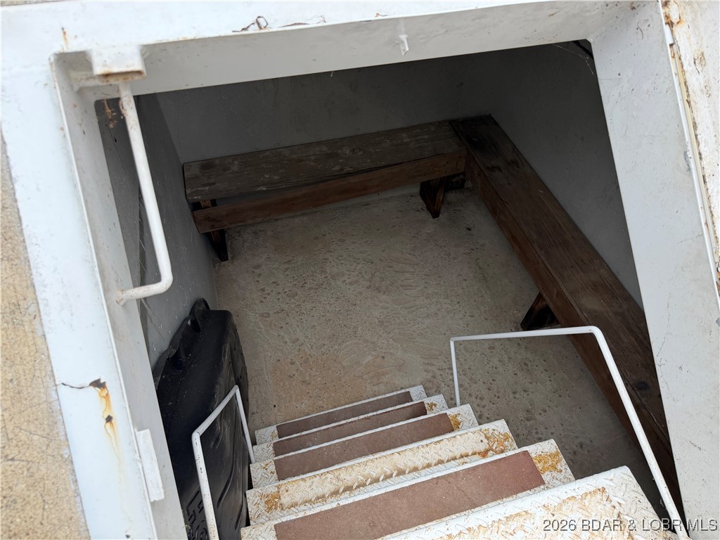 7 Arapaho Road Eldon, MO 65026 - Photo 24 of 26 Storm Shelter with benches