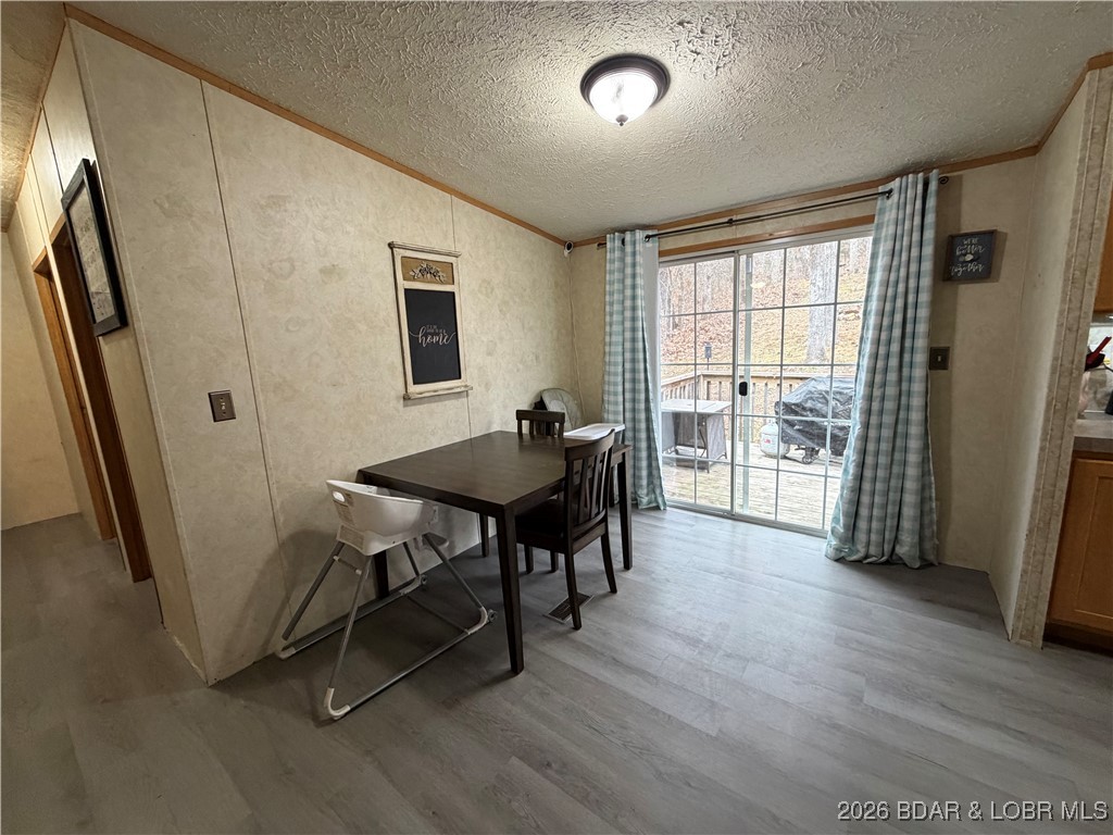 7 Arapaho Road Eldon, MO 65026 - Photo 7 of 26 Dining Area with access to back deck