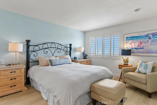 a spacious bathroom with a granite countertop sink mirror and shower