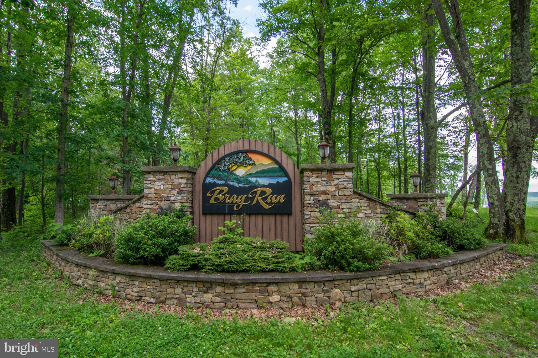 Lot 13 Bray Run Road Oakland, MD 21550 - Photo 2 of 23 a front view of a house with garden